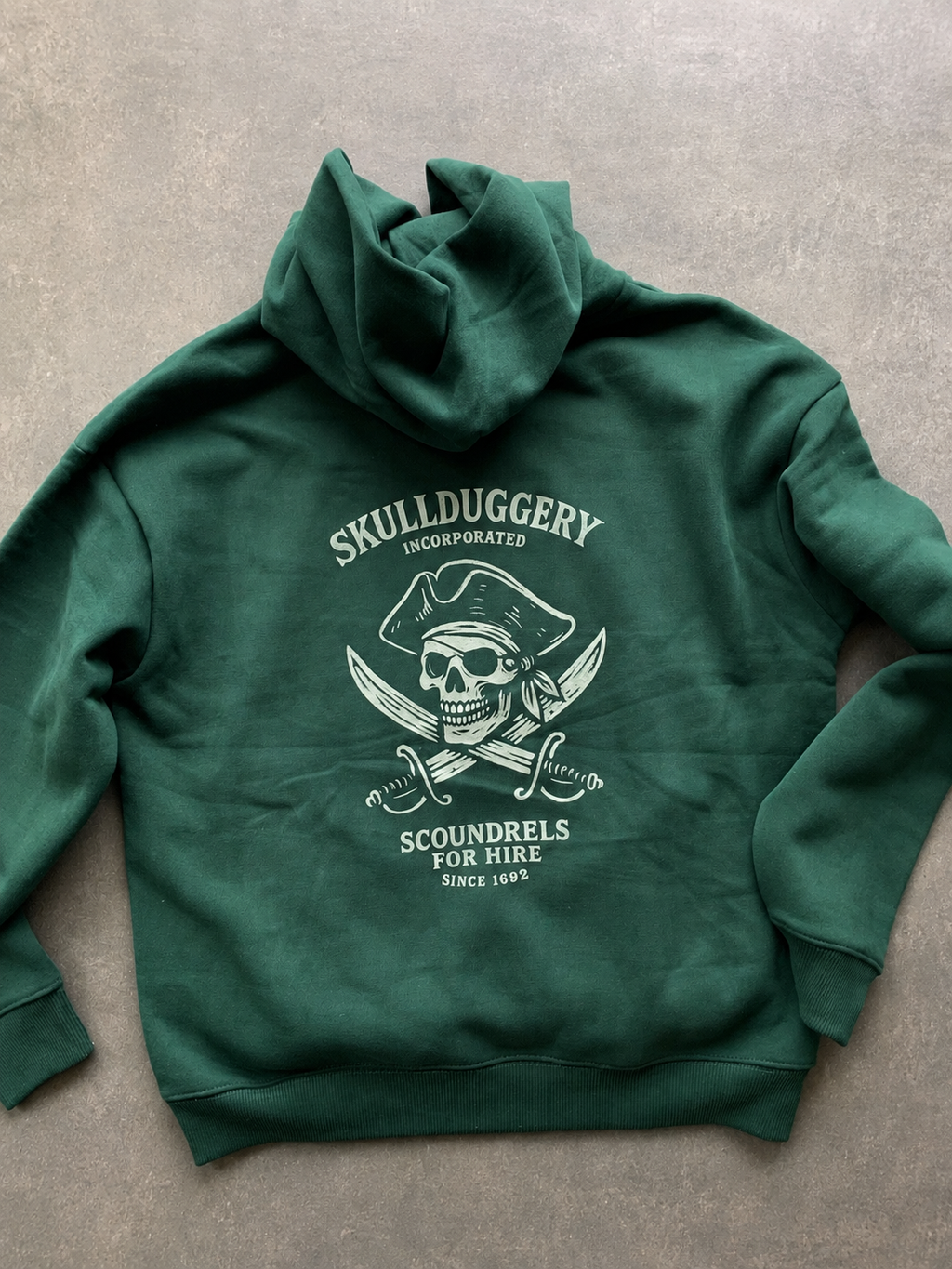 Skullduggery Scoundrels Hoodie in bottle green