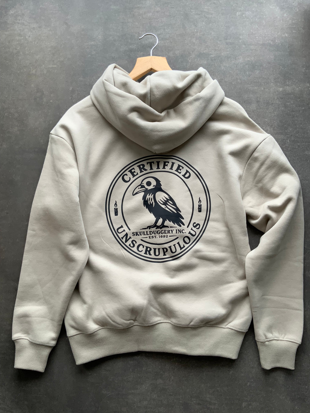 Skullduggery Certified Unscrupulous Hoodie in Stone