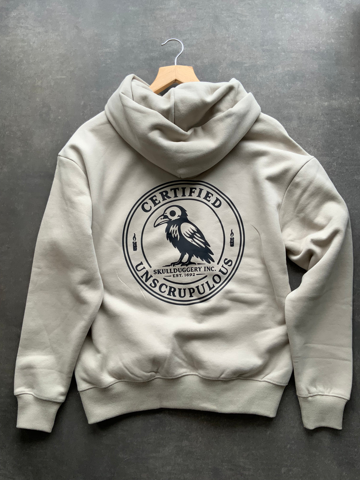 Skullduggery Certified Unscrupulous Hoodie in Stone
