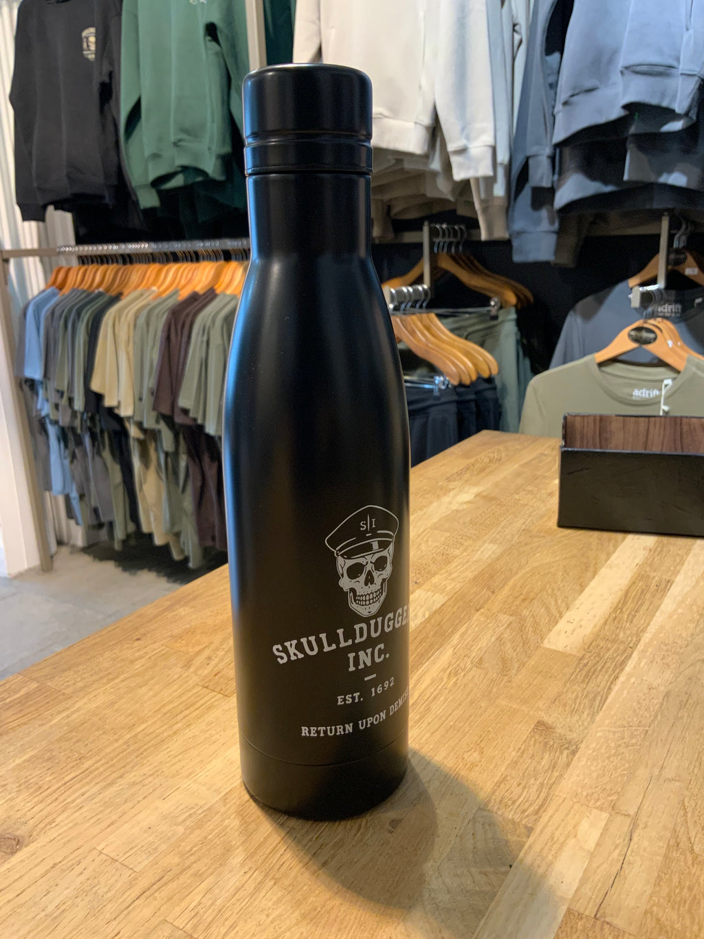 Skullduggery Inc. Water Bottle - Hydration for the ethically flexible.