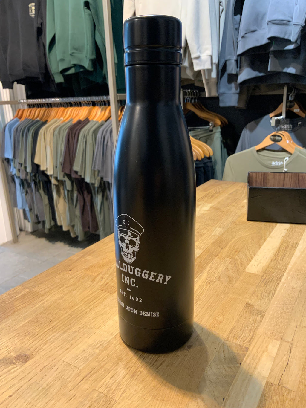 Skullduggery Inc. Water Bottle - Hydration for the ethically flexible.