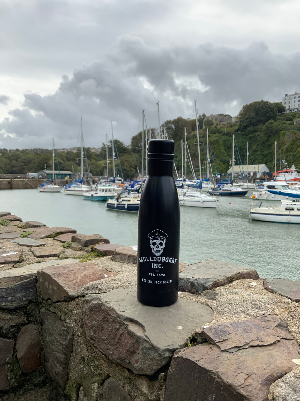 Skullduggery Inc. Water Bottle - Hydration for the ethically flexible.